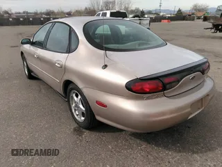 1999 Ford Taurus SE with VIN 1FAFP53S9XA330603, listed as a IAAI auction lot 41819819 with 207,025 mi miles. Bid and sale history available at carsss.com. Image 3.