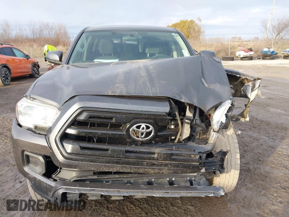 2016 Toyota Tacoma SR5 with VIN 5TFAX5GN1GX056450, listed as a IAAI auction lot 41215339 with 129,604 mi miles. Bid and sale history available at carsss.com. Image 13.