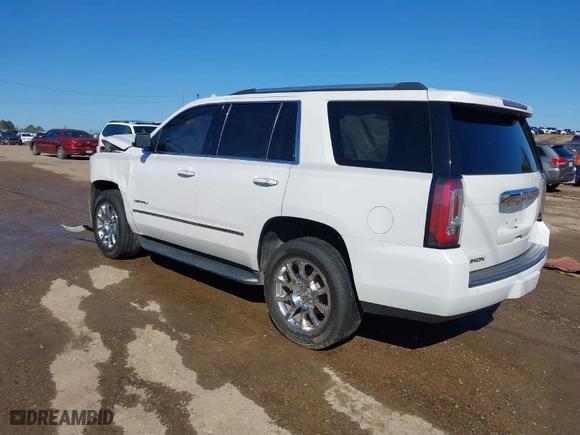 2016 GMC Yukon Denali with VIN 1GKS2CKJ7GR476072, listed as a IAAI auction lot 41611329 with 152,052 mi miles. Bid and sale history available at carsss.com. Image 3.