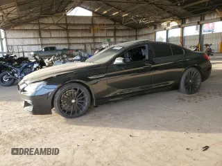 2014 BMW 6 Series 650i with VIN WBA6B2C52ED129040, listed as a Copart auction lot 83829924 with 116,674 mi miles and Salvage Title. Bid and sale history available at carsss.com. Image 1.