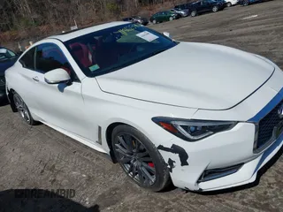 2017 Infiniti Q60 Red Sport 400 with VIN JN1FV7ELXHM701112, listed as a IAAI auction lot 41862580 with 89,385 mi miles and . Bid and sale history available at carsss.com. Image 1.