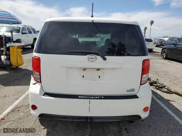 2014 Scion xB with VIN JTLZE4FEXEJ057699, listed as a Copart auction lot 48556255 with 142360 miles and Salvage Title. Bid and sale history available at carsss.com. Image 6.