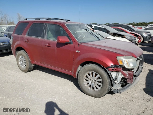 2009 Mercury Mariner Premier with VIN 4M2CU87G49KJ11181, listed as a Copart auction lot 70799534 with 167,273 mi miles and Salvage Title. Bid and sale history available at carsss.com. Image 4.