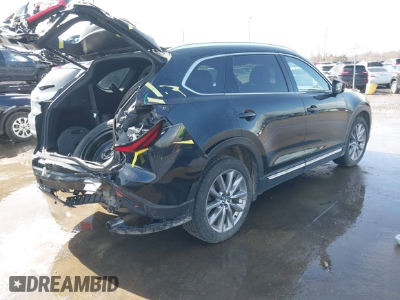 2020 Mazda CX-9 Grand Touring with VIN JM3TCBDY2L0413839, listed as a IAAI auction lot 41720713 with 48,964 mi miles and . Bid and sale history available at DreamBid. Image 4.