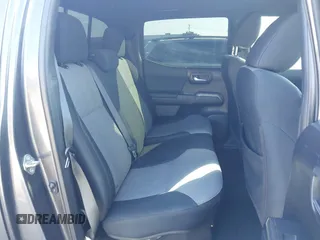 2020 Toyota Tacoma SR5 z VIN 3TMCZ5AN9LM296826, wystawiony jako IAAI lot #42533149 z przebiegiem 72 375 mil mil oraz . Historia ofert i sprzedaży dostępna na DreamBid. Obrazek 8.
