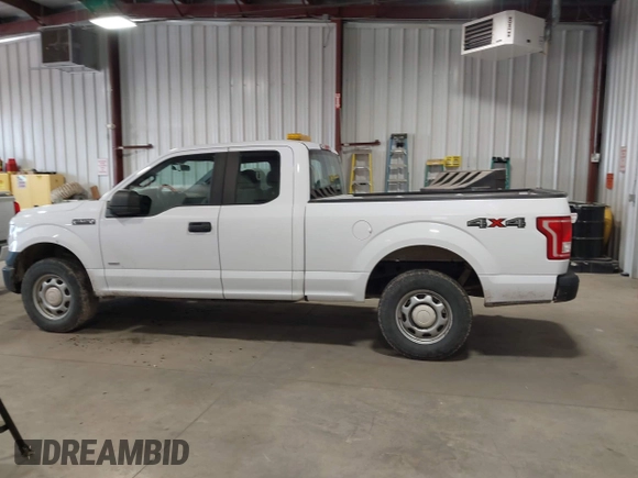 2015 Ford F-150 XLT with VIN 1FTEX1EP6FKE21697, listed as a IAAI auction lot 41960136 with 199,653 mi miles. Bid and sale history available at carsss.com. Image 14.