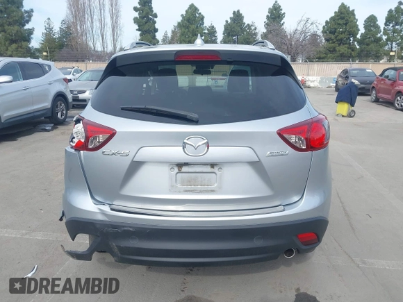 2016 Mazda CX-5 Grand Touring with VIN JM3KE2DY9G0723921, listed as a IAAI auction lot 41681522 with 83,893 mi miles. Bid and sale history available at carsss.com. Image 16.