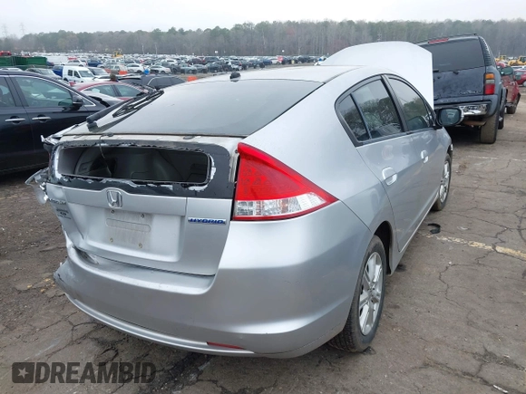 2010 Honda Insight EX with VIN JHMZE2H77AS022538, listed as a IAAI auction lot 41804579 with 184,000 mi miles and . Bid and sale history available at DreamBid. Image 4.
