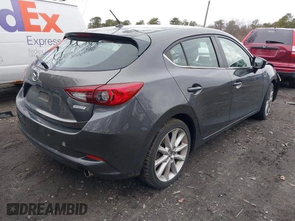 2017 Mazda 3 Touring with VIN 3MZBN1L7XHM135792, listed as a IAAI auction lot 41732569 with 81,368 mi miles and . Bid and sale history available at DreamBid. Image 4.