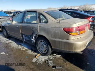 2001 Saturn LS z VIN 1G8JU52FX1Y552416, wystawiony jako Copart lot #41967165 z przebiegiem 196 403 mil mil oraz Szkody całkowita. Historia ofert i sprzedaży dostępna na DreamBid. Obrazek 2.