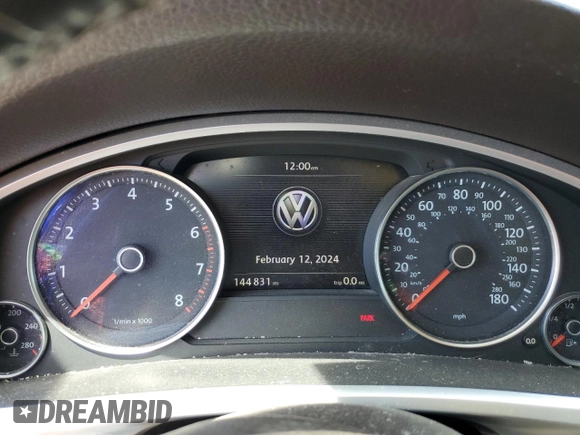 2013 Volkswagen Touareg Lux with VIN WVGEF9BP8DD002947, listed as a Copart auction lot 52590164 with 144,831 mi miles and Salvage Title. Bid and sale history available at DreamBid. Image 9.