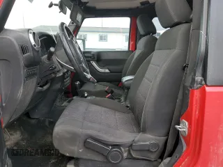 2012 Jeep Wrangler Rubicon with VIN 1C4BJWCG8CL202637, listed as a Copart auction lot 49145935 with 113,520 mi miles and Salvage Title. Bid and sale history available at DreamBid. Image 7.