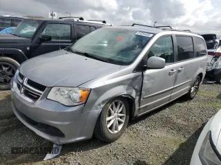 2016 Dodge Grand Caravan SXT with VIN 2C4RDGCG8GR312046, listed as a Copart auction lot 51334455 with 180,072 mi miles and Salvage Title. Bid and sale history available at DreamBid. Image 1.