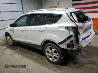 2016 Ford Escape Titanium with VIN 1FMCU9J93GUB78230, listed as a Copart auction lot 51661025 with 98,515 mi miles and Salvage Title. Bid and sale history available at DreamBid. Image 2.