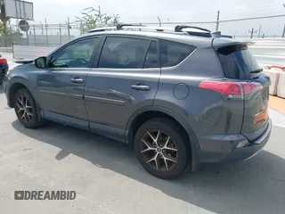 2017 Toyota RAV4 SE with VIN JTMJFREV5HJ155712, listed as a IAAI auction lot 42613998 with 72,112 mi miles and . Bid and sale history available at DreamBid. Image 3.