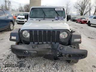 2023 Jeep Wrangler Sport S with VIN 1C4HJXDGXPW532573, listed as a Copart auction lot 43852985 with 96,720 mi miles and Clean Title. Bid and sale history available at DreamBid. Image 5.