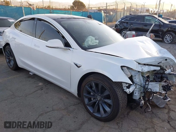 2020 Tesla Model 3 Performance with VIN 5YJ3E1EC1LF602516, listed as a IAAI auction lot 41841216 with 28,967 mi miles and . Bid and sale history available at DreamBid. Image 1.
