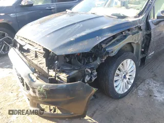 2015 Ford Fusion SE Hybrid with VIN 3FA6P0LUXFR165766, listed as a IAAI auction lot 41409353 with 32,388 mi miles. Bid and sale history available at carsss.com. Image 6.