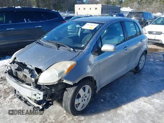 2010 Toyota Yaris with VIN JTDKT4K32A5293998, listed as a IAAI auction lot 41635631 with 221,414 mi miles. Bid and sale history available at carsss.com. Image 2.