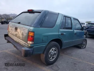 1996 Isuzu Rodeo z VIN 4S2CK58E1T4331031, wystawiony jako Copart lot #78573514 z przebiegiem 218 994 mil mil oraz Szkody całkowita. Historia ofert i sprzedaży dostępna na DreamBid. Obrazek 3.