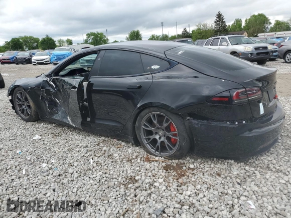 2023 Tesla Model S Plaid with VIN 5YJSA1E67PF511354, listed as a Copart auction lot 56648975 with 69,002 mi miles and Salvage title. Bid and sale history available at DreamBid. Image 2.