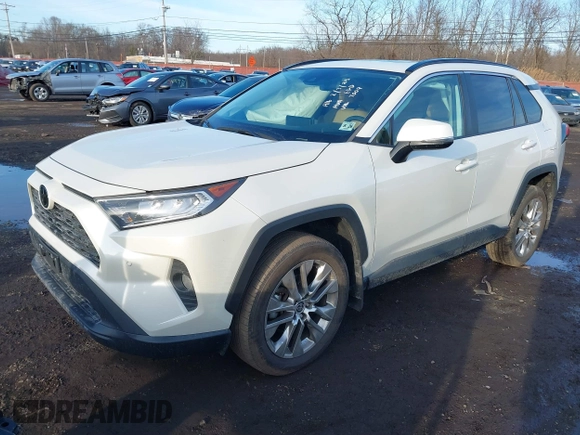 2021 Toyota RAV4 XLE Premium z VIN 2T3A1RFV2MW217009, wystawiony jako IAAI lot #41526066 z przebiegiem 36 619 mil mil oraz . Historia ofert i sprzedaży dostępna na DreamBid. Obrazek 19.