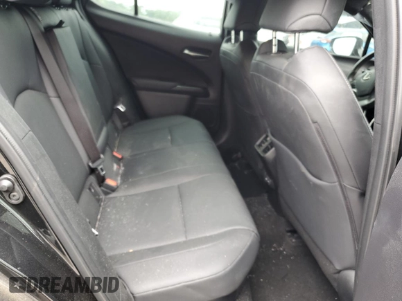2023 Lexus UX 250h Premium с VIN JTHP6JBH8P2133821, выставлен на аукционе Copart как лот 61007355 с пробегом 32 540 миль миль и Списание • Salvage title. История ставок и продаж доступна на DreamBid. Изображение 11.