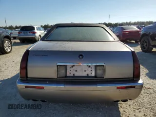 1996 Cadillac Eldorado z VIN 1G6EL12Y6TU613813, wystawiony jako Copart lot #78274114 z przebiegiem Nie podano mil oraz Szkoda całkowita • Salvage title. Historia ofert i sprzedaży dostępna na DreamBid. Obrazek 6.