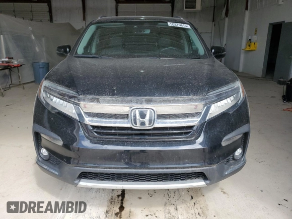 2021 Honda Pilot Touring 8-Passenger with VIN 5FNYF6H97MB062638, listed as a Copart auction lot 50876815 with 49,662 mi miles and Salvage title. Bid and sale history available at DreamBid. Image 5.