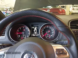 2012 Volkswagen GTI w/Sunroof & Navi PZEV with VIN WVWGD7AJ2CW100248, listed as a IAAI auction lot 41905190 with 106,489 mi miles and . Bid and sale history available at DreamBid. Image 7.