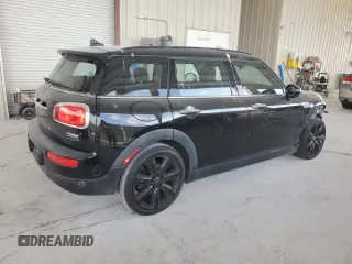 2016 MINI Clubman z VIN WMWLN5C51G2B28099, wystawiony jako Copart lot #55139845 z przebiegiem 89 683 mil mil oraz Szkoda całkowita • Salvage title. Historia ofert i sprzedaży dostępna na DreamBid. Obrazek 3.