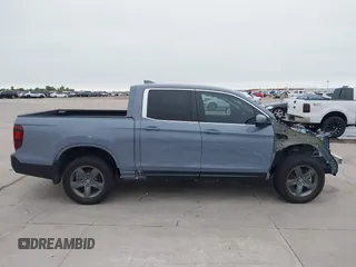 2023 Honda Ridgeline RTL with VIN 5FPYK3F58PB047099, listed as a IAAI auction lot 42313390 with Not provided miles and . Bid and sale history available at DreamBid. Image 14.