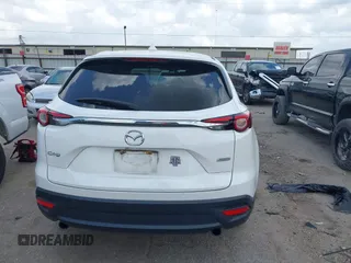 2016 Mazda CX-9 Sport z VIN JM3TCABY1G0111316, wystawiony jako IAAI lot #42085945 z przebiegiem 98 691 mil mil oraz . Historia ofert i sprzedaży dostępna na DreamBid. Obrazek 17.