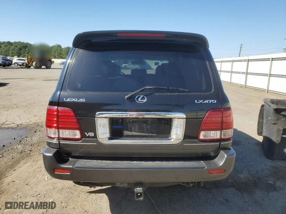 2006 Lexus LX 470 with VIN JTJHT00W664006446, listed as a Copart auction lot 73165774 with 294,950 mi miles and Salvage Title. Bid and sale history available at carsss.com. Image 6.
