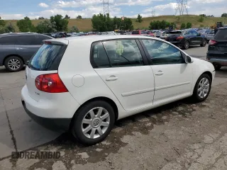2009 Volkswagen Rabbit S with VIN WVWDB71K79W085935, listed as a Copart auction lot 60697594 with 102,780 mi miles and Salvage title. Bid and sale history available at DreamBid. Image 3.