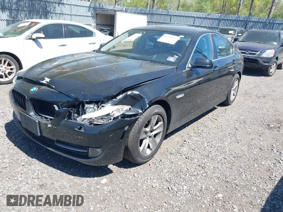 2013 BMW 5 Series 528i xDrive with VIN WBAXH5C50DDW12545, listed as a IAAI auction lot 42139257 with 140,710 mi miles and . Bid and sale history available at carsss.com. Image 2.