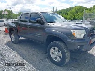 2014 Toyota Tacoma z VIN 5TFLU4EN0EX091220, wystawiony jako IAAI lot #42332608 z przebiegiem 204 034 mil mil oraz . Historia ofert i sprzedaży dostępna na DreamBid. Obrazek 1.