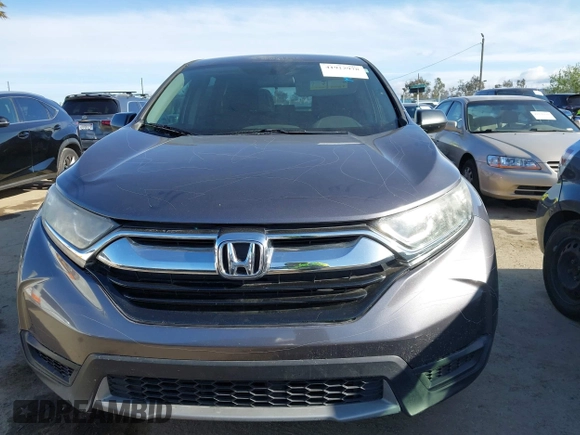 2019 Honda CR-V LX z VIN 2HKRW6H39KH219441, wystawiony jako IAAI lot #41912978 z przebiegiem 99 828 mil mil oraz . Historia ofert i sprzedaży dostępna na DreamBid. Obrazek 12.