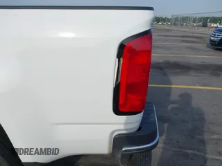2021 Chevrolet Colorado 2WD Work Truck z VIN 1GCHSBEA0M1198797, wystawiony jako IAAI lot #42092525 z przebiegiem 67 580 mil mil oraz . Historia ofert i sprzedaży dostępna na DreamBid. Obrazek 18.
