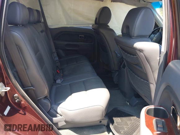 2007 Honda Pilot EX-L with VIN 2HKYF18527H510015, listed as a IAAI auction lot 42720416 with 155,685 mi miles and . Bid and sale history available at DreamBid. Image 8.