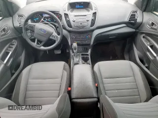 2017 Ford Escape S with VIN 1FMCU0F78HUA80539, listed as a Copart auction lot 57485415 with 131,734 mi miles and Salvage title. Bid and sale history available at DreamBid. Image 8.