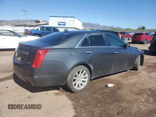 2014 Cadillac CTS AWD with VIN 1G6AW5SX2E0141060, listed as a Copart auction lot 57281445 with 137,904 mi miles and Salvage title. Bid and sale history available at DreamBid. Image 3.
