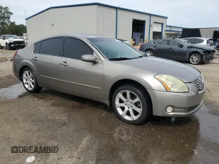 2004 Nissan Maxima SE with VIN 1N4BA41E34C888731, listed as a Copart auction lot 74233304 with 197,764 mi miles and Salvage Title. Bid and sale history available at carsss.com. Image 4.