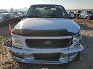 1998 Ford F-150 z VIN 1FTZX18W3WKB01774, wystawiony jako Copart lot #88670315 z przebiegiem 102 301 mil mil oraz Szkoda całkowita • Salvage title. Historia ofert i sprzedaży dostępna na DreamBid. Obrazek 5.