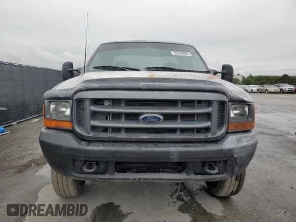2000 Ford F-250 XL with VIN 1FTNX21F3YED35736, listed as a Copart auction lot 50309805 with 303,811 mi miles and Salvage title. Bid and sale history available at DreamBid. Image 5.