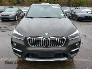2018 BMW X1 xDrive28i with VIN WBXHT3C37J5K26738, listed as a Copart auction lot 35778903 with 34,916 mi miles. Bid and sale history available at carsss.com. Image 5.