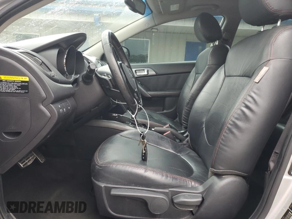 2013 Kia Forte SX с VIN KNAFW5A32D5701398, выставлен на аукционе Copart как лот 59786385 с пробегом 95 607 миль миль и Списание • Salvage title. История ставок и продаж доступна на DreamBid. Изображение 7.