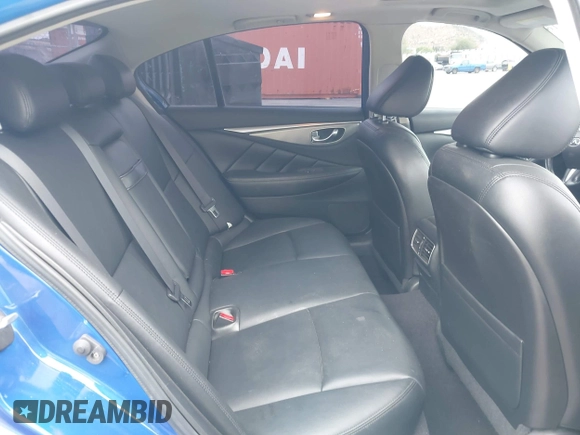 2014 Infiniti Q50 with VIN JN1BV7AP6EM689012, listed as a IAAI auction lot 42063216 with 114,785 mi miles and . Bid and sale history available at DreamBid. Image 8.