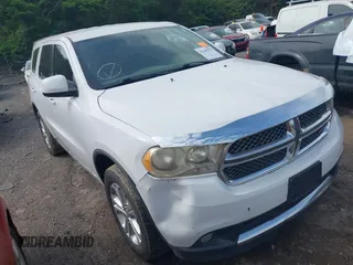2013 Dodge Durango SXT z VIN 1C4RDJAG4DC512491, wystawiony jako IAAI lot #42276406 z przebiegiem 219 766 mil mil oraz . Historia ofert i sprzedaży dostępna na DreamBid. Obrazek 1.