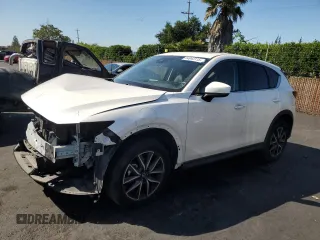 2017 Mazda CX-5 Grand Touring with VIN JM3KFBDL7H0202831, listed as a Copart auction lot 54943115 with 69,933 mi miles and Salvage Title. Bid and sale history available at carsss.com. Image 1.